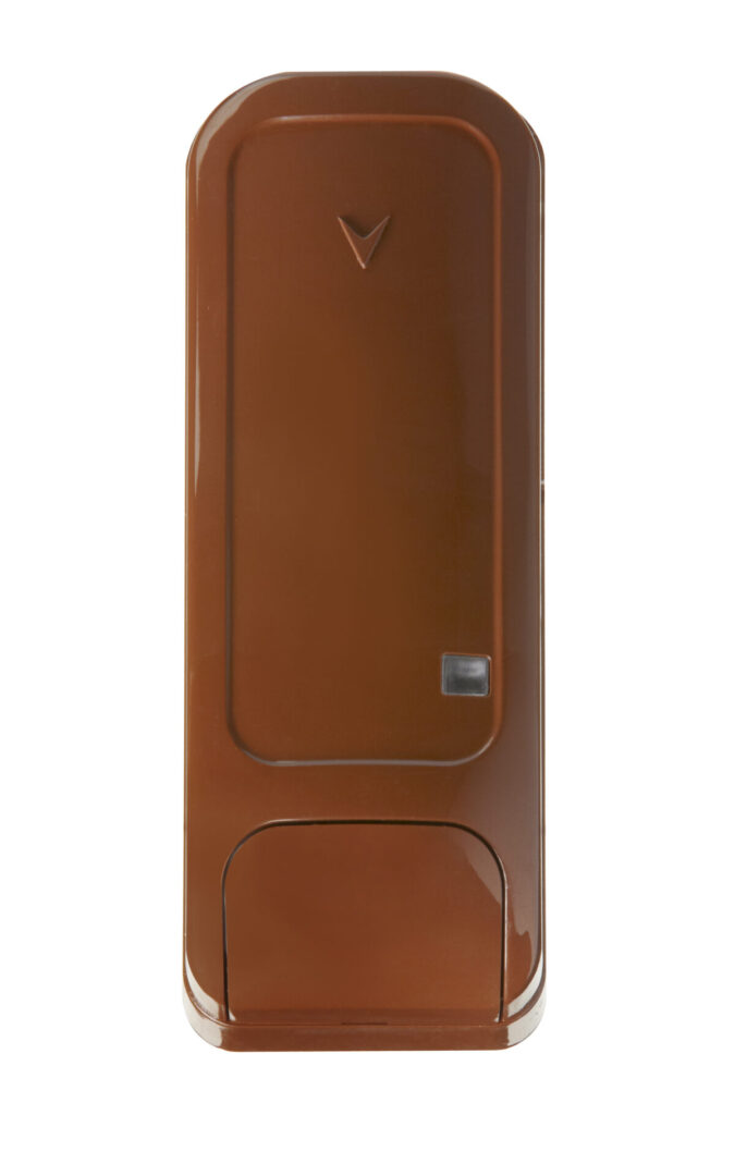 A brown door with a metal handle.